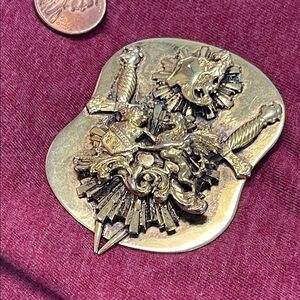 Gold and Black Brooch